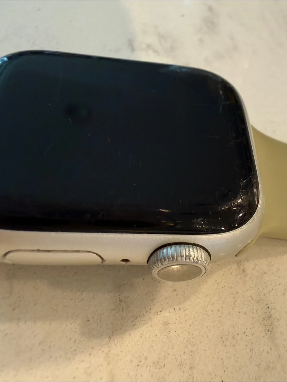 Apple Watch Series 7, 41mm with neutral Sport Band and Silver Aluminum Case